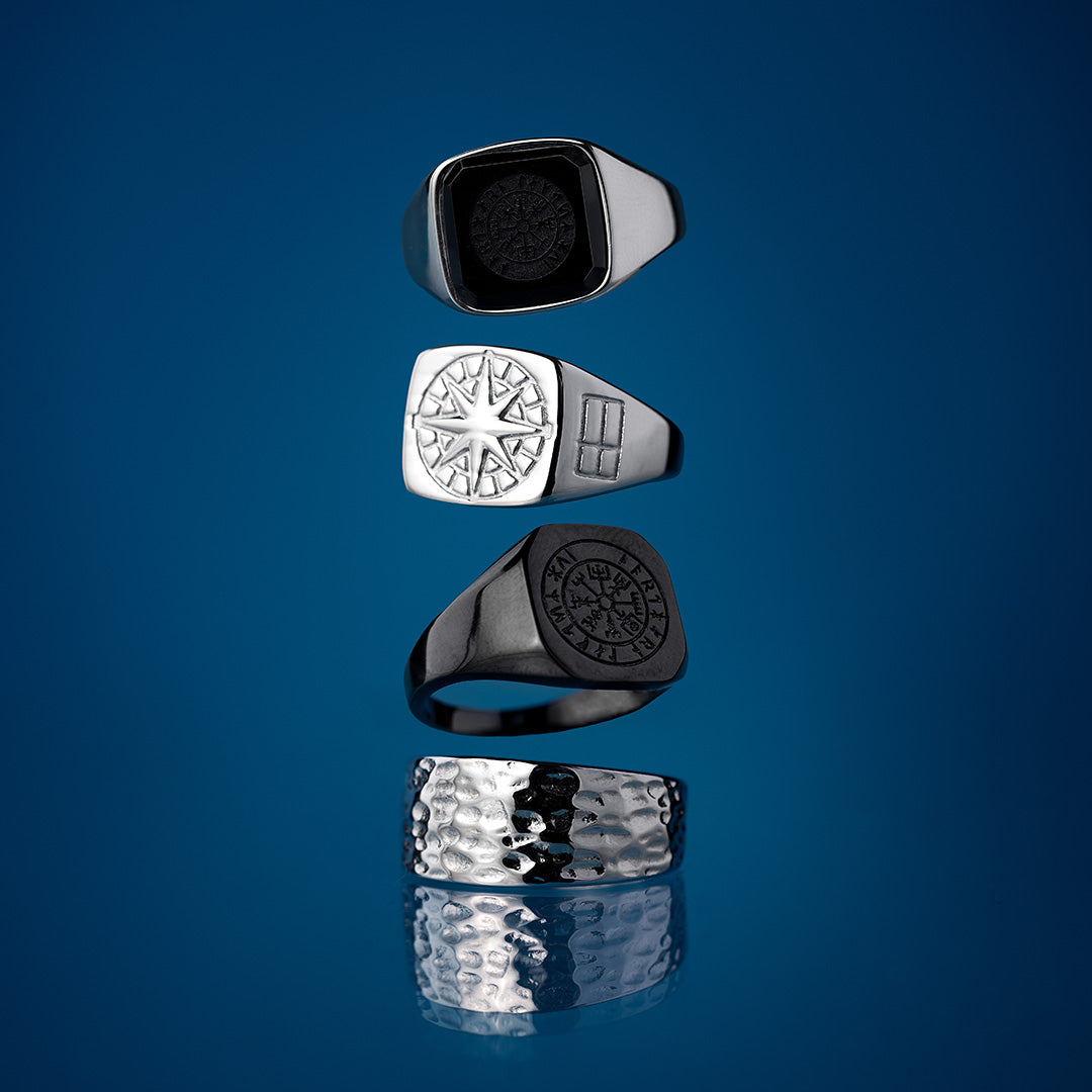 Bestselling rings from Northern Legacy on blue background.