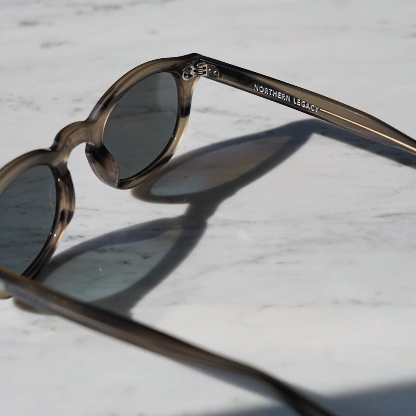 Grey 2024 tortoiseshell sunglasses